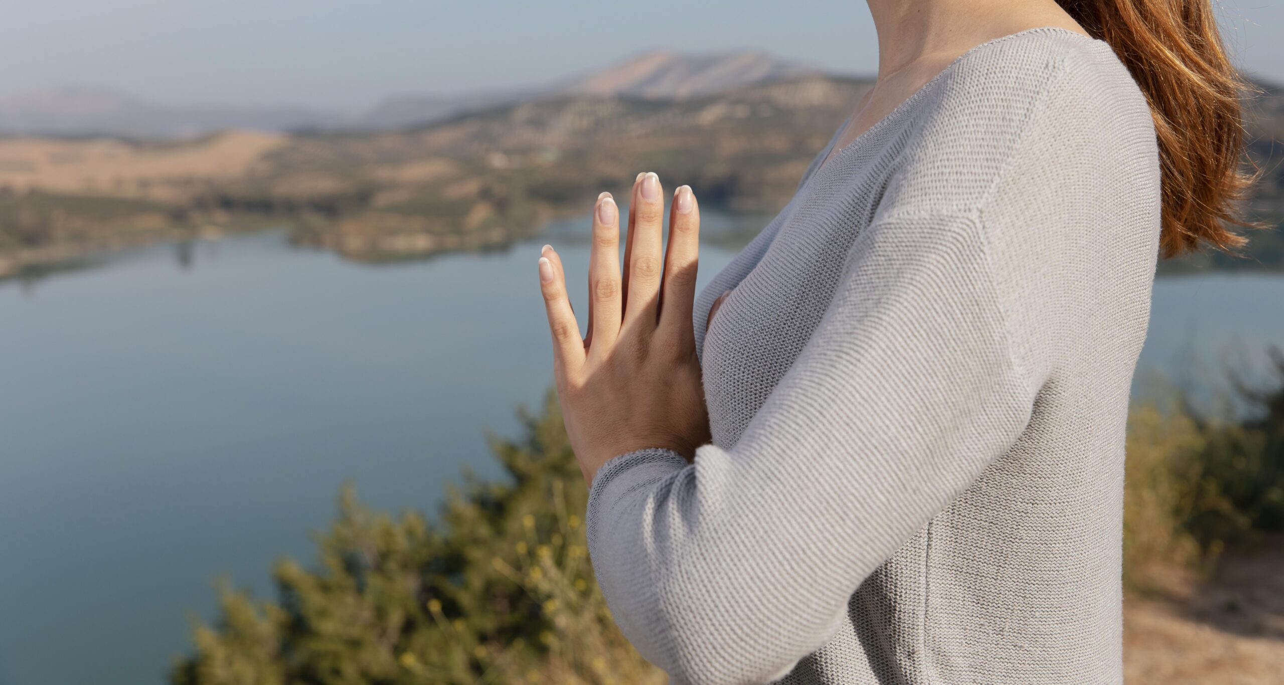 side-view-woman-meditating-nature